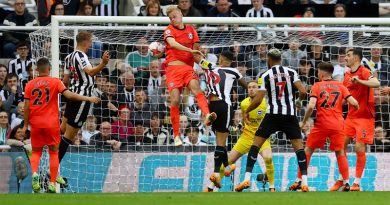 Dan Burn scores the second goal for Newcastle in their 4-1 win over Brighton