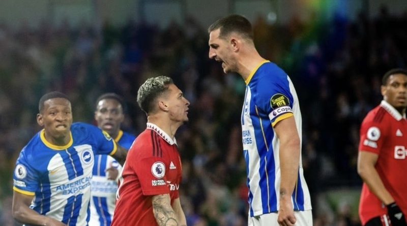 Lewis Dunk and Antony square up during Brighton and against Manchester United