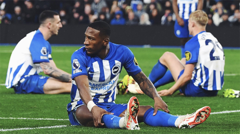 Albion players on the floor during Brighton 0-3 Arsenal at the Amex