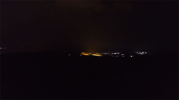 The Amex Stadium at night as seen from Falmer Road