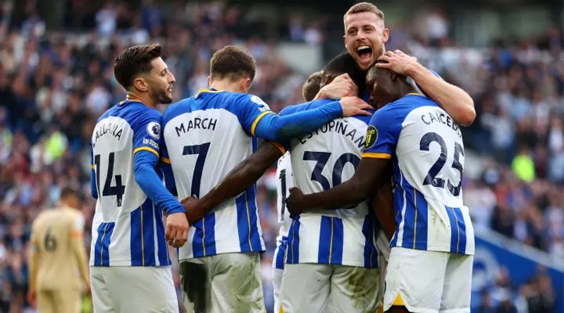 Brighton players celebrate their 4-1 win over Chelsea