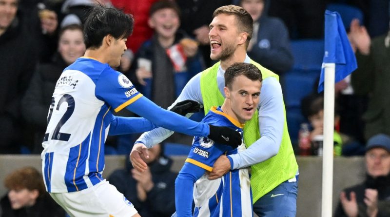Solly March celebrates scoring for Brighton in their 3-0 win over Liverpool