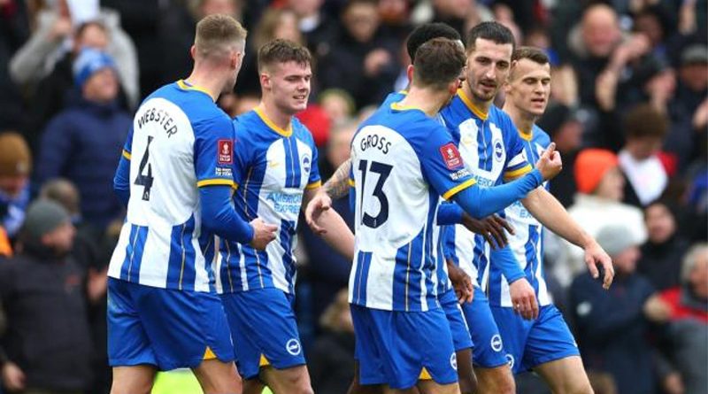 Brighton players celebrate their 2-1 win over Liverpool in the FA Cup