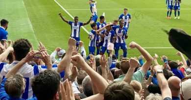 Brighton players celebrate their 3-0 win at Arsenal