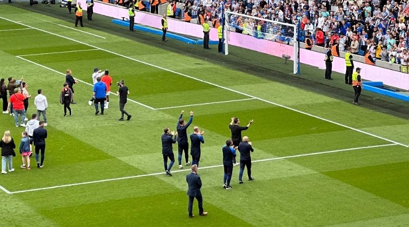 Roberto De Zerbi and his coaching staff celebrate Brighton qualifying for Europe after beating Southampton 3-1 at the Amex