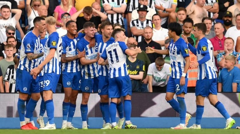 Brighton players celebrate their 3-1 win over Newcastle United