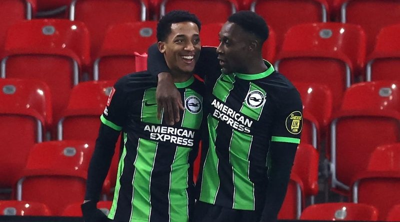 Joao Pedro and Danny Welbeck celebrate Brighton winning 4-2 at Stoke in the FA Cup
