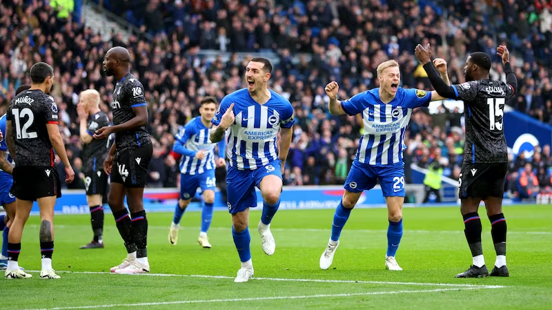 Lewis Dunk celebrates opening the scoring for Brighton in their 4-1 win over Crystal Palace