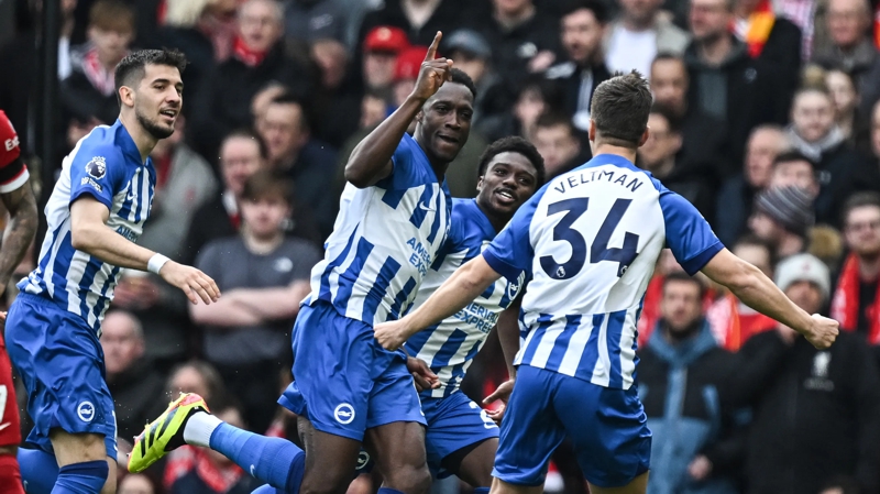 Danny Welbeck celebrates scoring for Brighton in their 2-1 defeat at Liverpool