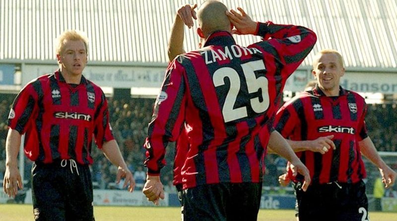Bobby Zamora wearing the Brighton AC Milan away kit of 1999 to 2002